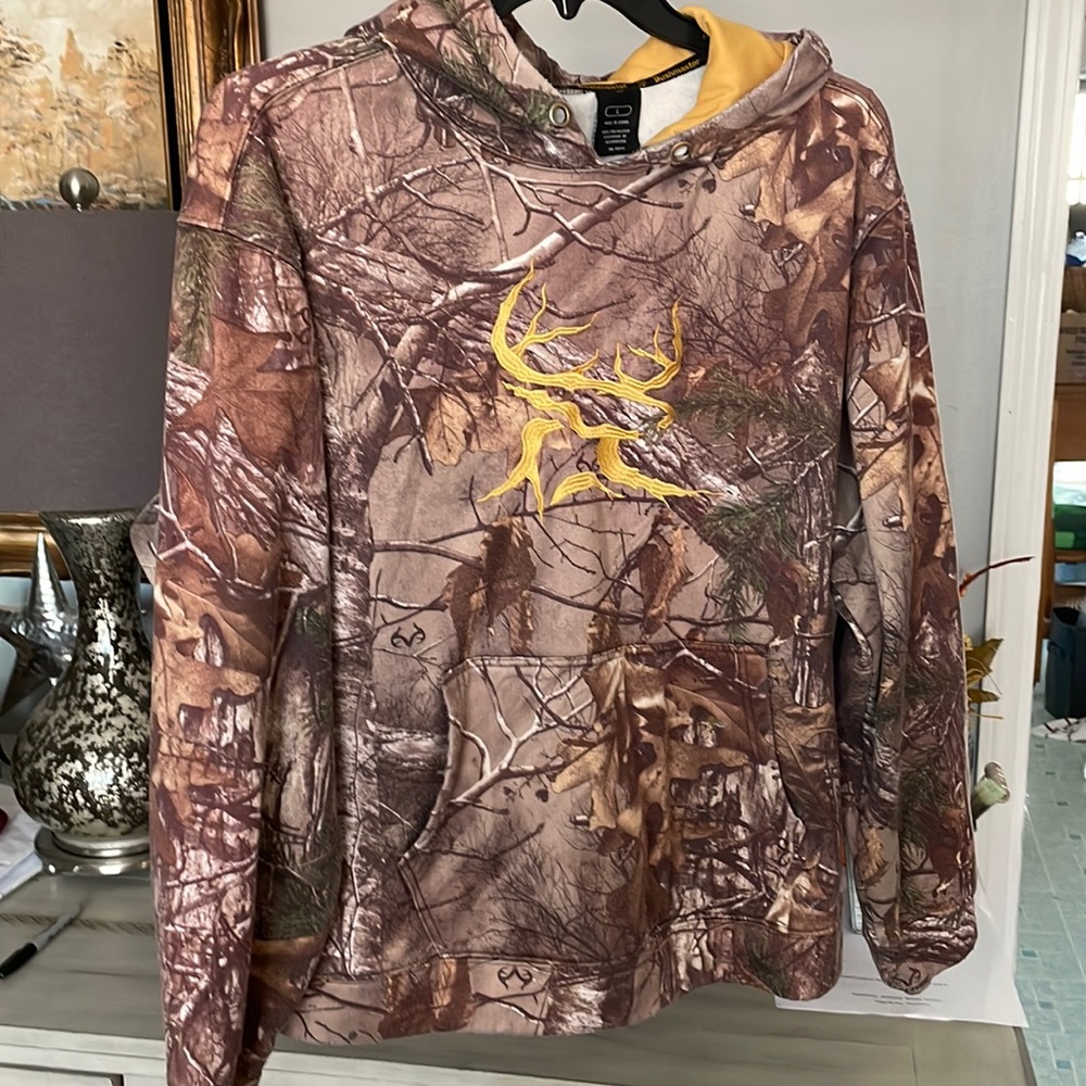 Bushmaster size large hundred percent polyester hoodie camouflage with gold deer